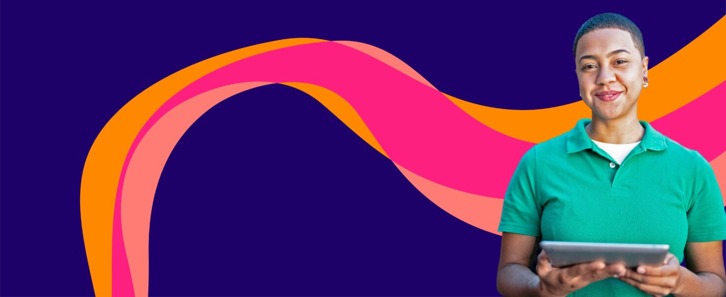 A person in a green shirt holds a tablet against a vibrant abstract background with wavy orange, pink, and red lines.