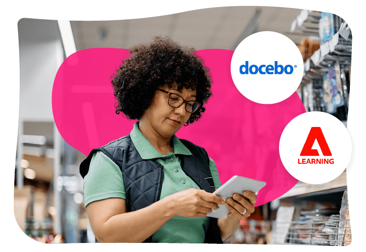 A person in a store setting uses a tablet. Logos for Docebo and Adobe Learning are visible in the image.