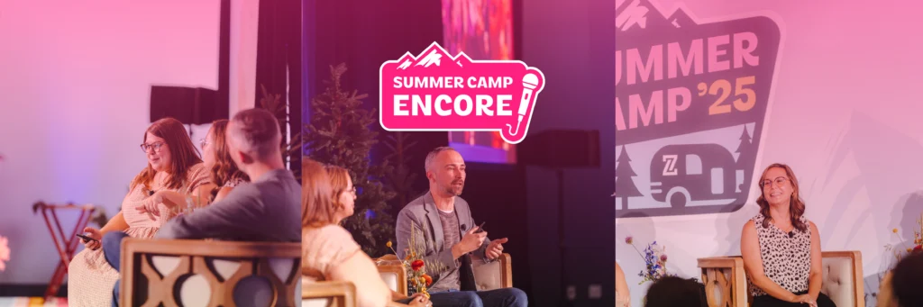 A group of people participate in a panel discussion at Summer Camp Encore 2025, with a central speaker and branded event signage in the background.