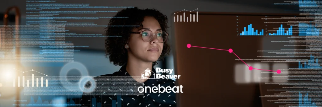 A person with glasses looks at data visualizations and code overlays on a screen, with "Busy Beaver" and "onebeat" logos visible in the center.