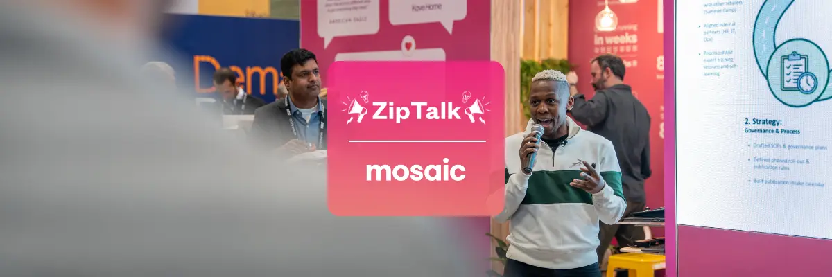 A person speaks into a microphone in front of a presentation screen at a Zip Talk Mosaic event, with two other people visible in the background.
